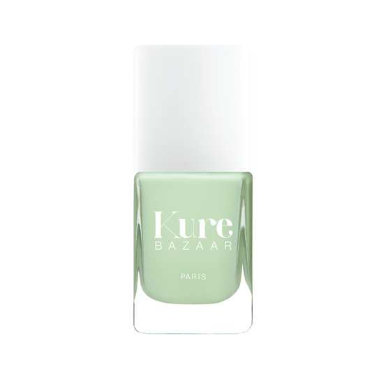 bottle of matcha latte nail polish by kure bazaar soft pastel green